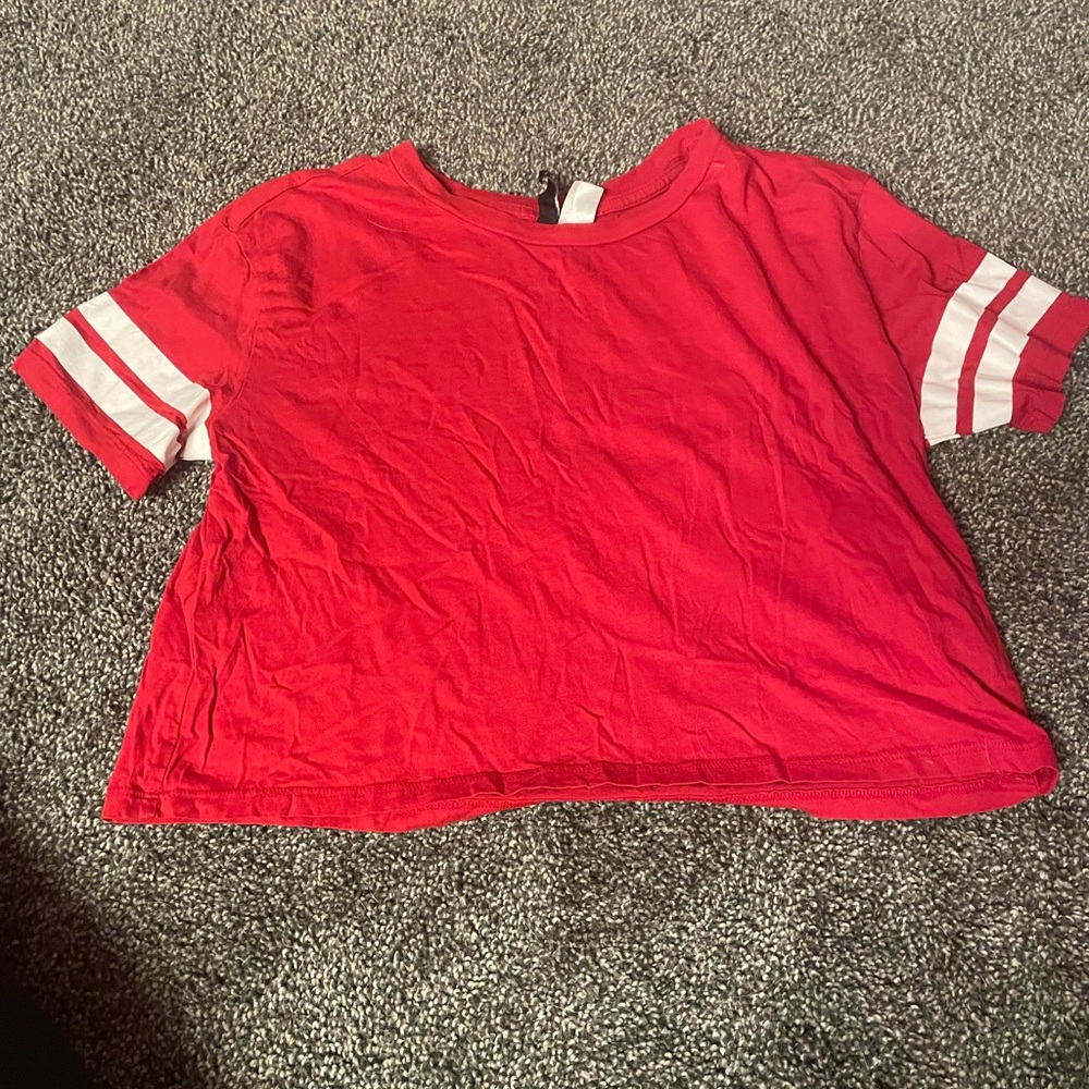 Red shirt with striped sleeve